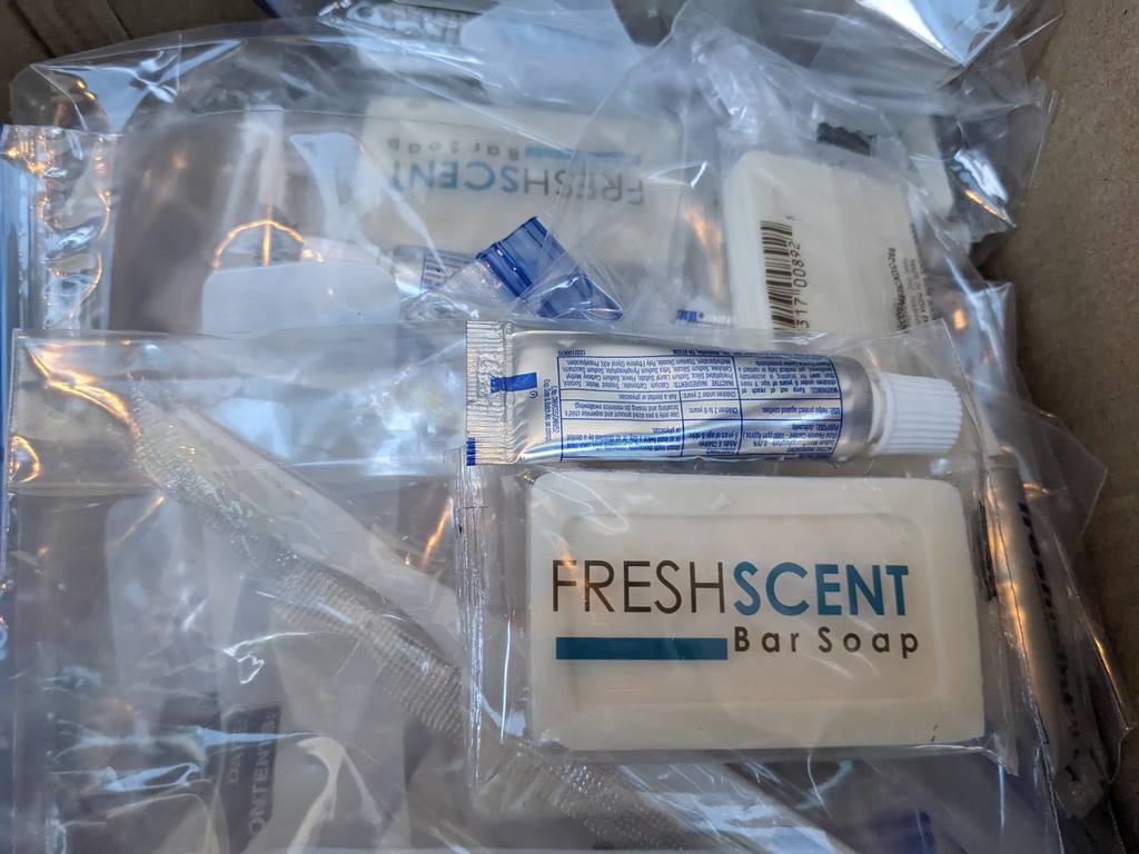 bag of fresh scent soap bar and a small silver toothpaste tube
